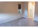 Bedroom with neutral walls, tile floors, and window with blinds at 1134 S Pointe Alexis Dr, Tarpon Springs, FL 34689
