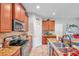 Kitchen with stainless steel appliances and granite countertops at 30805 Satinleaf Run, Brooksville, FL 34602