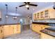 Modern kitchen with granite countertops and stainless steel appliances at 4008 Greenmark Ln, Valrico, FL 33596