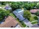 Aerial view of house with pool, showcasing surrounding neighborhood at 4008 Greenmark Ln, Valrico, FL 33596