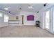 Large main bedroom with carpet flooring, a garden tub, and French doors at 4008 Greenmark Ln, Valrico, FL 33596