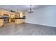 Bright dining room with hardwood floors and kitchen views at 4008 Greenmark Ln, Valrico, FL 33596