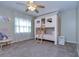 bedroom with bunk bed, plush toys, and carpeted floor at 4008 Greenmark Ln, Valrico, FL 33596