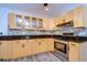 Modern kitchen with granite countertops and stainless steel appliances at 4008 Greenmark Ln, Valrico, FL 33596