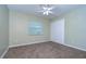 Bright bedroom with neutral walls and carpet flooring at 4008 Greenmark Ln, Valrico, FL 33596