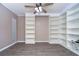 Spacious library with built-in shelving and hardwood floors at 4008 Greenmark Ln, Valrico, FL 33596