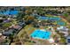 Aerial view of community featuring tennis courts, basketball court, and playground at 4008 Greenmark Ln, Valrico, FL 33596