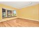 Bright dining room with large bay window and hardwood floors at 4612 Landscape Dr, Tampa, FL 33624