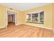 Dining room features hardwood floors and French doors at 4612 Landscape Dr, Tampa, FL 33624