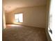 Open-concept living room boasting neutral carpet and a large window that provides natural light at 10223 Us Highway 301, Dade City, FL 33525