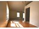 Inviting living space featuring hardwood floors, abundant natural light, and an open layout at 10223 Us Highway 301, Dade City, FL 33525