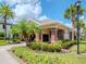 Community mailbox area with landscaping and palm trees at 9107 Carolina Wren Dr, Tampa, FL 33626