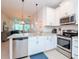 Open concept kitchen with stainless steel appliances and granite countertops at 9107 Carolina Wren Dr, Tampa, FL 33626