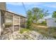 Landscaped backyard and screened-in patio area at 10735 64Th N Ave, Seminole, FL 33772