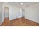 Bedroom boasts wood floors and a large closet at 10735 64Th N Ave, Seminole, FL 33772