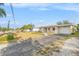 Inviting single-story home featuring a one-car garage and a well-maintained front yard at 10735 64Th N Ave, Seminole, FL 33772