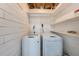 A Laundry area with side-by-side washer and dryer at 10735 64Th N Ave, Seminole, FL 33772