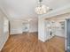 Inviting living room features hardwood floors and seamlessly connects to the kitchen at 10735 64Th N Ave, Seminole, FL 33772