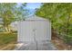 Backyard with a metal storage shed offering ample space for tools and outdoor equipment at 10735 64Th N Ave, Seminole, FL 33772