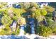 This aerial view displays the home's proximity to nearby homes and street access at 3010 E 149Th Ave, Lutz, FL 33559