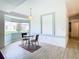 Cozy breakfast nook with small table and chairs, near kitchen at 13400 Norman Cir, Hudson, FL 34669