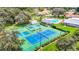 Community tennis and pickleball courts with green surface at 13400 Norman Cir, Hudson, FL 34669