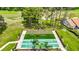 Two community pickleball courts with green surface at 13400 Norman Cir, Hudson, FL 34669