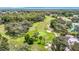 Golf course with lush green fairways and trees at 13400 Norman Cir, Hudson, FL 34669