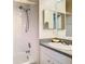 Bathroom with single vanity and shower/tub combo at 13400 Norman Cir, Hudson, FL 34669