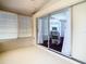 Bright sunroom with sliding glass doors leading to backyard at 13400 Norman Cir, Hudson, FL 34669