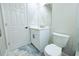 Updated bathroom with white vanity, new toilet and flooring at 3010 E 149Th Ave, Lutz, FL 33559