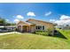 Charming single story home with attached garage and lush lawn at 29171 Orva Dr, Punta Gorda, FL 33982