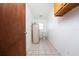 Small bathroom with toilet and water heater at 29171 Orva Dr, Punta Gorda, FL 33982