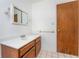 Clean bathroom featuring a single vanity and tiled floors at 29171 Orva Dr, Punta Gorda, FL 33982