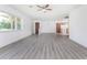 Spacious living room featuring wood-look floors at 29171 Orva Dr, Punta Gorda, FL 33982