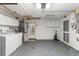 Attached garage with extra storage and laundry hookups at 7015 Flaggler Dr, Port Richey, FL 34668