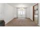 Bright dining area with a chandelier and access to sunroom at 7015 Flaggler Dr, Port Richey, FL 34668