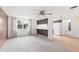 Living room with wood paneling and ceiling fan at 7015 Flaggler Dr, Port Richey, FL 34668