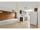 View of kitchen, dining area, and living room at 7015 Flaggler Dr, Port Richey, FL 34668