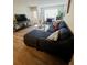 Spacious living room featuring a comfortable sectional sofa and stylish decor at 10200 Gandy Blvd # 1116, St Petersburg, FL 33702