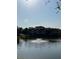 Tranquil lake view of the community with a water fountain at 10200 Gandy Blvd # 1116, St Petersburg, FL 33702