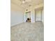 Spacious room with closet and neutral tile flooring at 761 Tremont Greens Ln # 61, Sun City Center, FL 33573