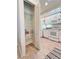 Functional pantry in the kitchen featuring ample shelving for storage and organization at 761 Tremont Greens Ln # 61, Sun City Center, FL 33573