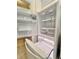 Interior of a clean, white refrigerator with shelves and crisper drawers, ready to store fresh ingredients at 761 Tremont Greens Ln # 61, Sun City Center, FL 33573