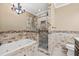 Spa-like bathroom with soaking tub and walk-in shower at 2707 W Leroy St, Tampa, FL 33607