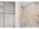 Bathroom with walk-in shower and built-in bench at 2707 W Leroy St, Tampa, FL 33607