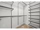 Large walk-in closet with wire shelving and hanging rod at 2707 W Leroy St, Tampa, FL 33607