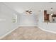 Spacious living area with tile floors and ceiling fan at 2707 W Leroy St, Tampa, FL 33607