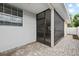 Screened patio with paver stones and access to backyard at 2707 W Leroy St, Tampa, FL 33607