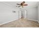 Spacious bedroom with ceiling fan and walk-in closet at 2707 W Leroy St, Tampa, FL 33607